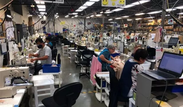 Marena employees producing protective masks