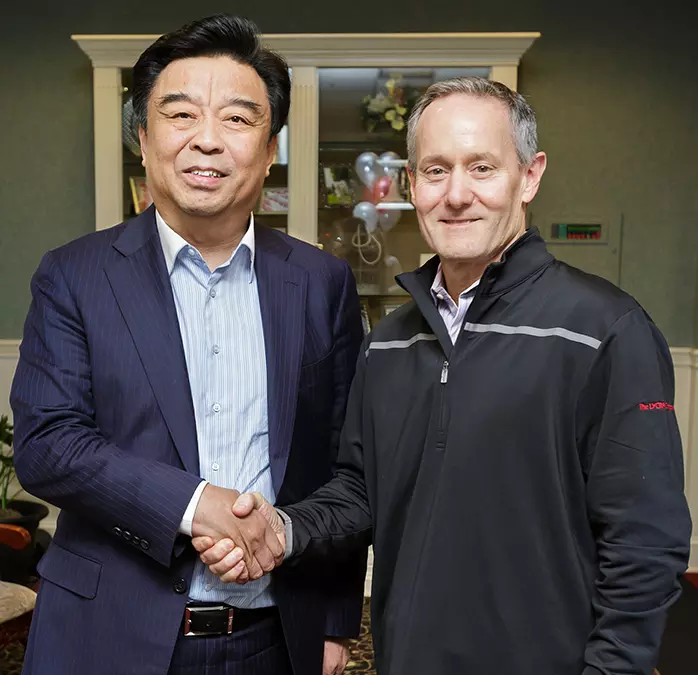 L to R: Yafu Qiu, chairman of the board of Shandong Ruyi Investment Holding and Dave Trerotola, CEO of The LYCRA Company