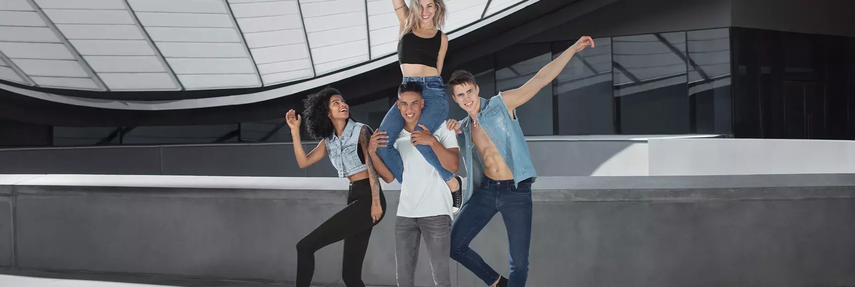 People moving freely in stretch denim jeans powered by solutions from the LYCRA® brand providing lasting comfort, fit, shape.