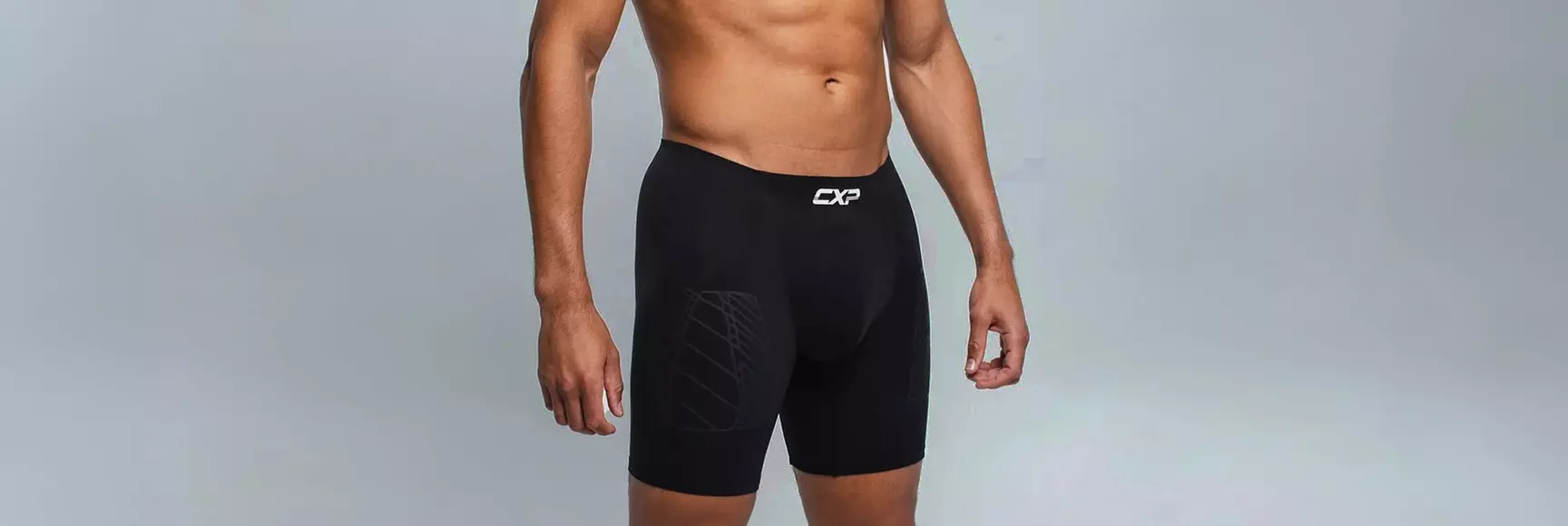 A model wears black athletic underwear made by the brand CXP.