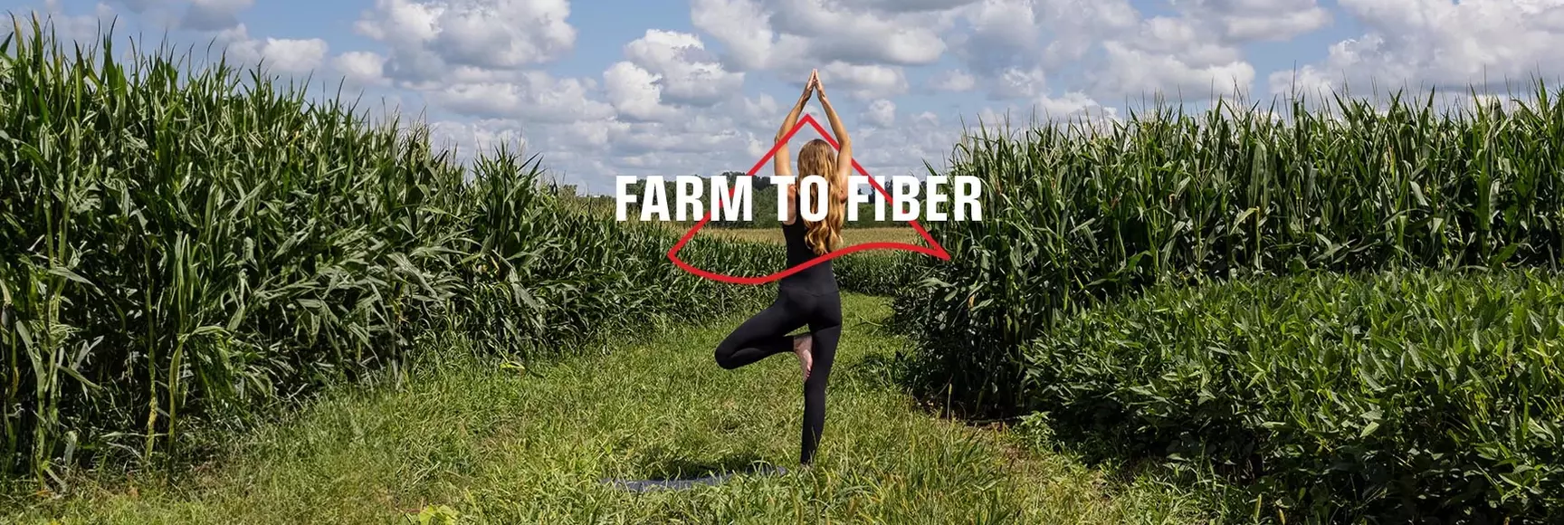 ISPO farm to fiber woman in tree pose in field