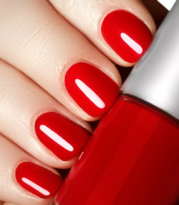 Finger nails with red nail polish made with a liquid form of LYCRA® fiber is more duarable and can last up to 10 days.
